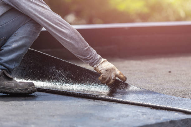Professional Emergency Waterproofing technician working in Clarksburg, MD